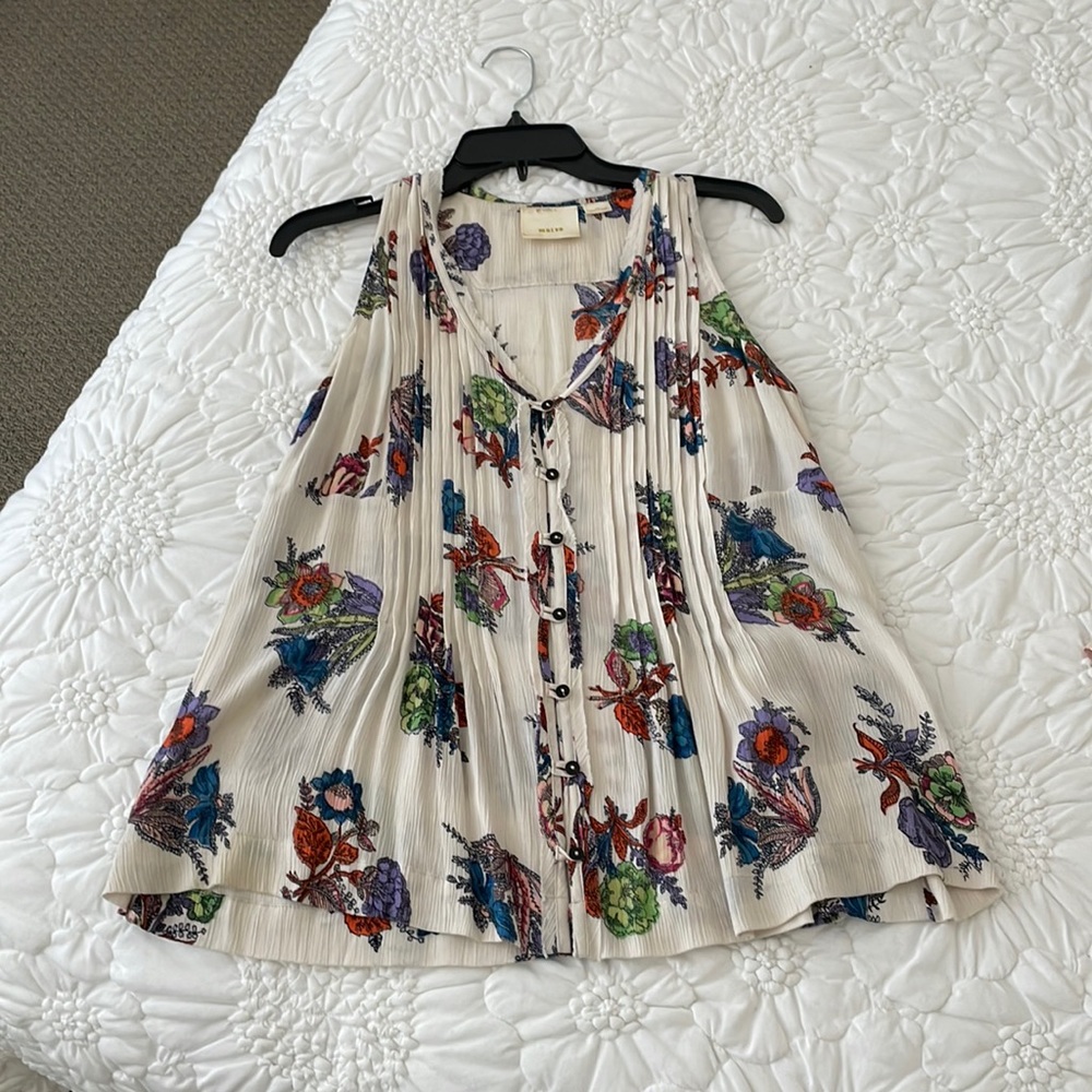 Anthropologie. Cream blouse with buttons & floral detailing.